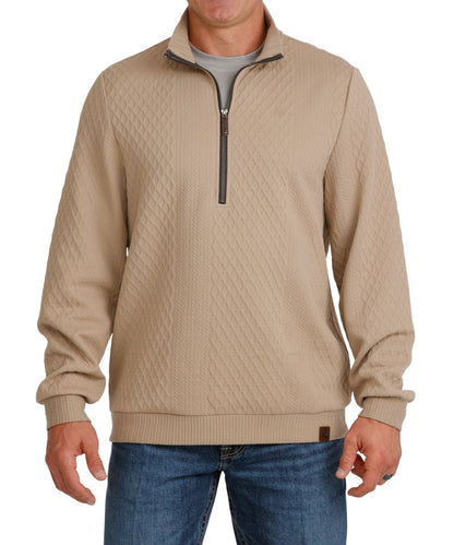 Front view of the men's stone/beige Cinch 1/2 zip pullover featuring the cable knit and diamond pattern design, 1/2 zip closure, mock collar, long sleeves, and leather logo patch at the hem