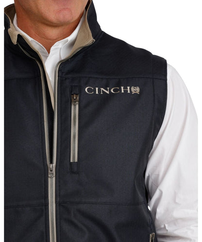 Close-up view of the men's textured polyester vest featuring the durable water-resistant finish
