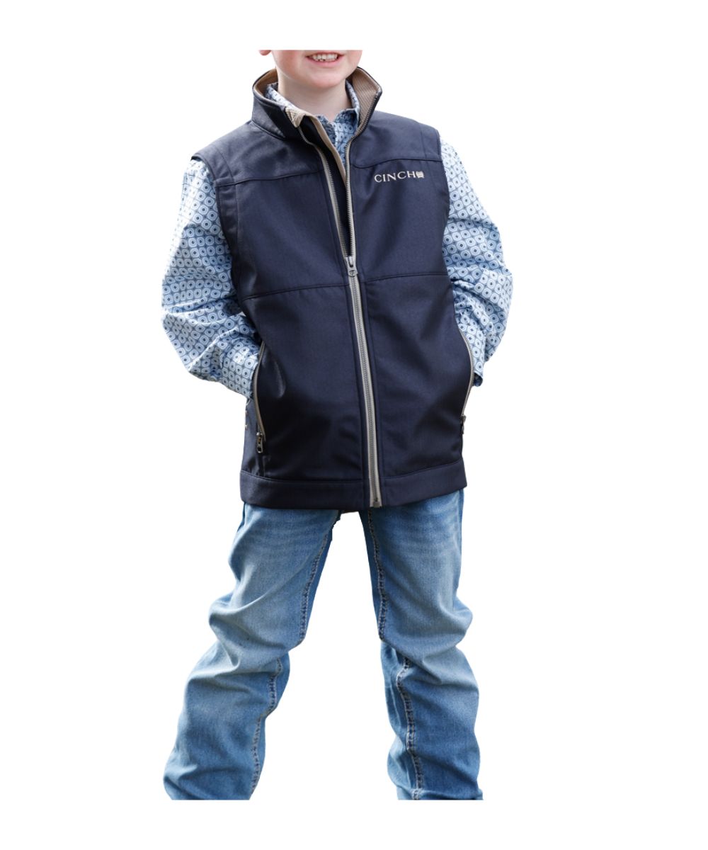 Front view of the boy's navy Cinch Bonded Vest featuring the textured polyester construction, zip closure, mock collar, durable water-resistance, and zippered hand pockets
