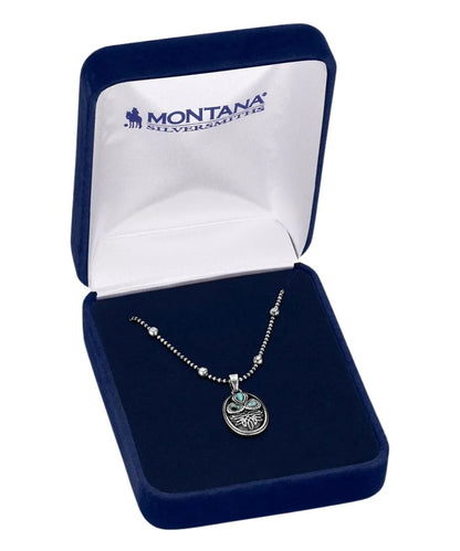 Boxed view of the women's boot stitch turquoise necklace