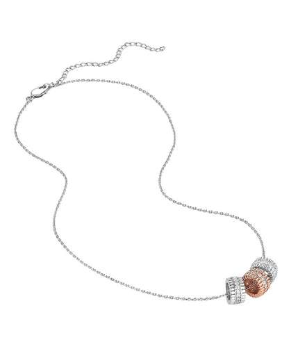 Lay view of the women's silver and rose gold ring necklace featuring clear cubic zirconia crystals