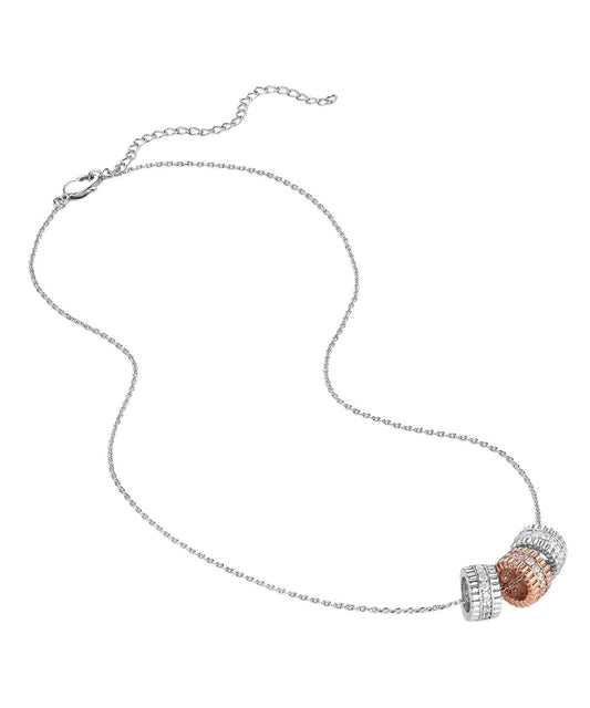 Lay view of the women's silver and rose gold ring necklace featuring clear cubic zirconia crystals