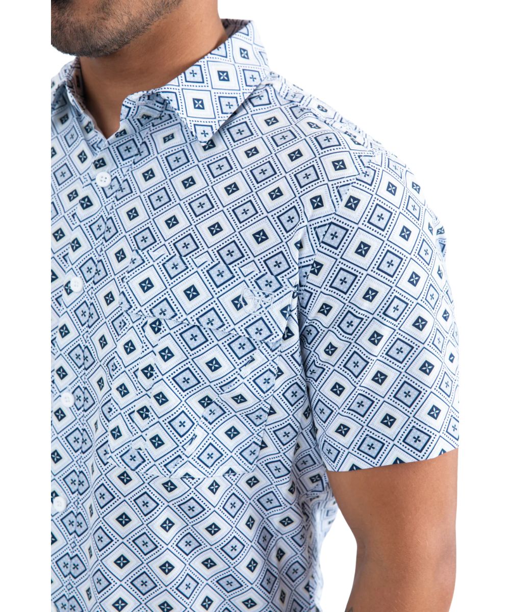 Close-up view of the short sleeve button-down featuring flap chest pockets and a spread collar.