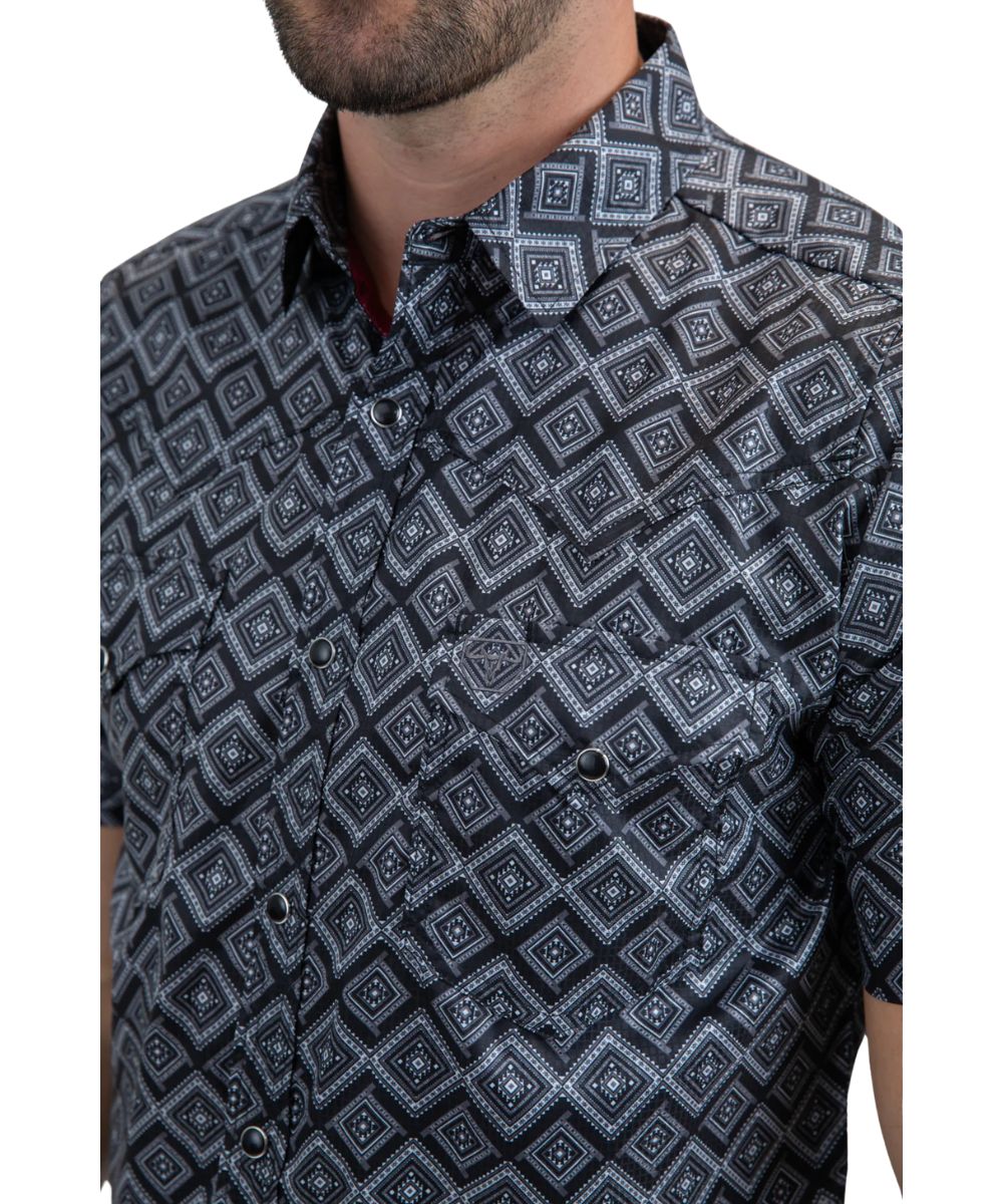 Close-up view of the black geometric print.