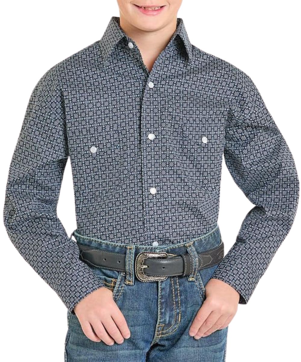 Front view of the boy's long sleeve navy snap shirt featuring a white geometric print