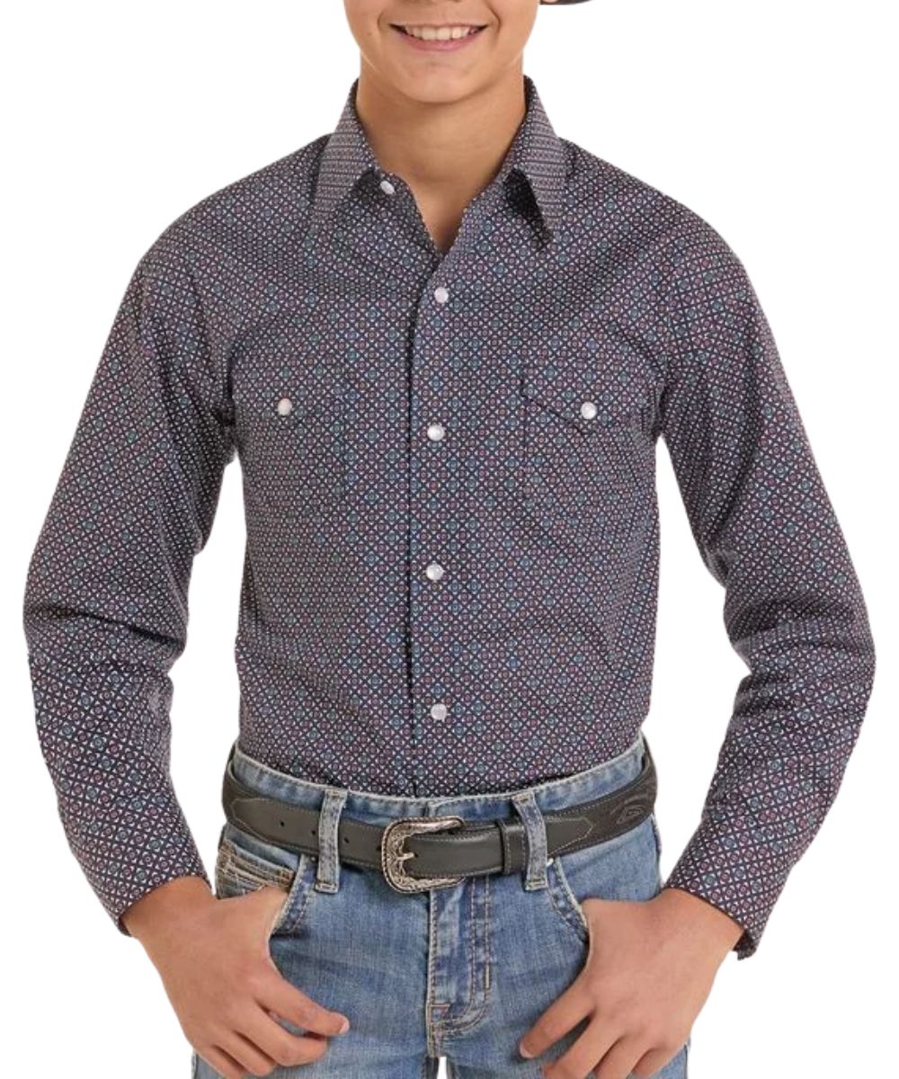 Front view of the boy's navy Panhandle long sleeve snap shirt featuring the spread collar, snap flap chest pockets, and the geometric print