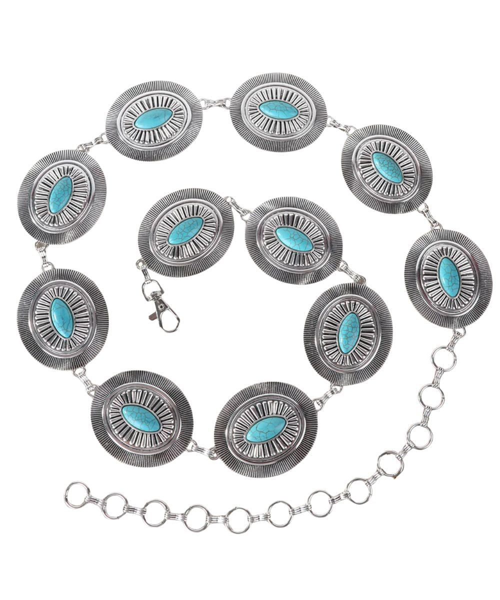 silver and turquoise concho belt with white background