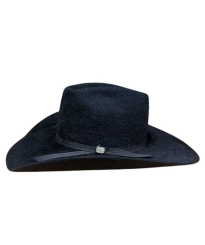 Side view of the black cowboy hat featuring the black hat band with silver logo buckle