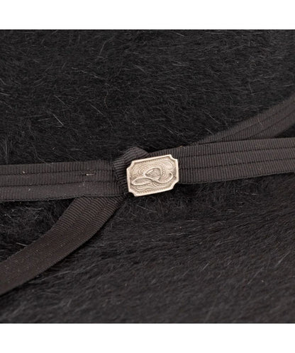 Close-up view of the black hat band and silver logo buckle