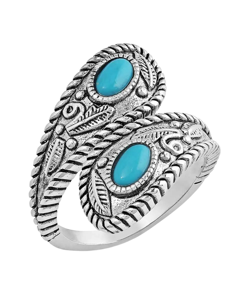 Top view of the women's silver wrap ring featuring the crafted turquoise stones