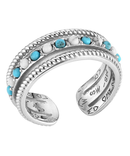 Top view of the women's silver cuff ring featuring the turquoise and howlite alternating stones