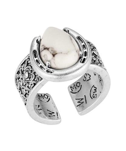 Women's Silver Ring With Howlite Stone Sitting In The Center Of The Horseshoe Design