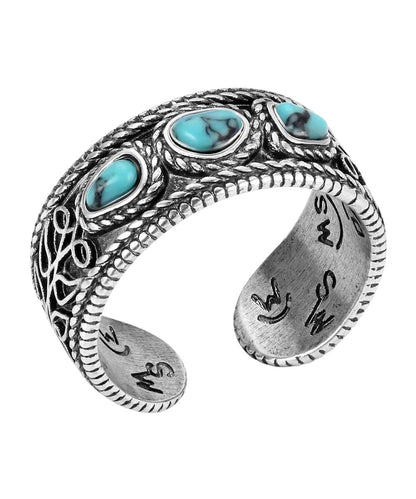 Top view of the women's silver open ring featuring the boot stitch design and crafted turquoise stones