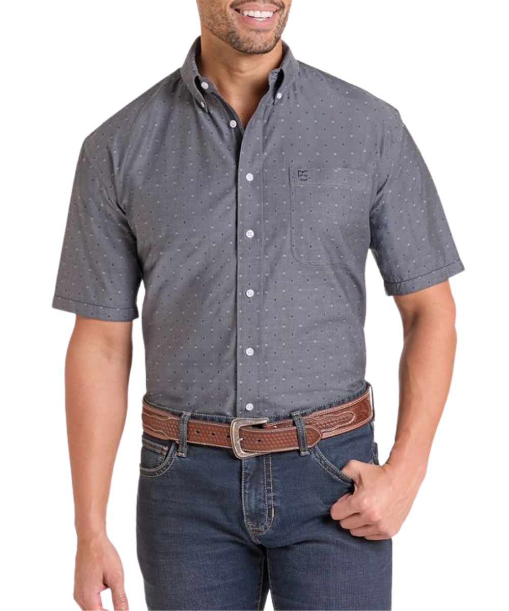 Front view of the men's black short sleeve button down shirt featuring the geometric print, chest pocket, and button down collar