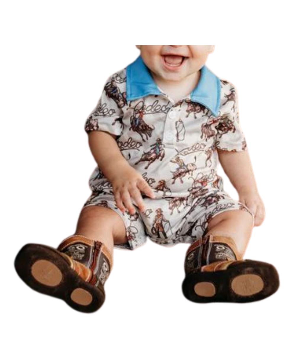Infant/Toddler Boy's Tan/Brown Short Sleeve Romper With A Spread Collar And Diaper Snap Seat Closure Featuring A Geometric Bull Rider Print That Reads: "Rodeo"