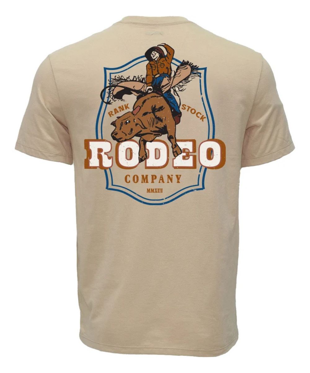 A beige short-sleeve t-shirt shown from the back, featuring a large graphic print of a cowboy riding a bucking bull with the text 'RODEO COMPANY' and 'RANK STOCK'.