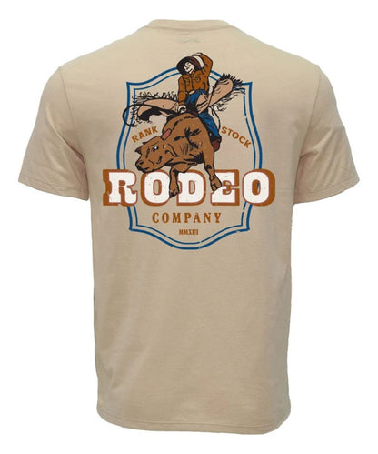 A beige short-sleeve t-shirt shown from the back, featuring a large graphic print of a cowboy riding a bucking bull with the text 'RODEO COMPANY' and 'RANK STOCK'.