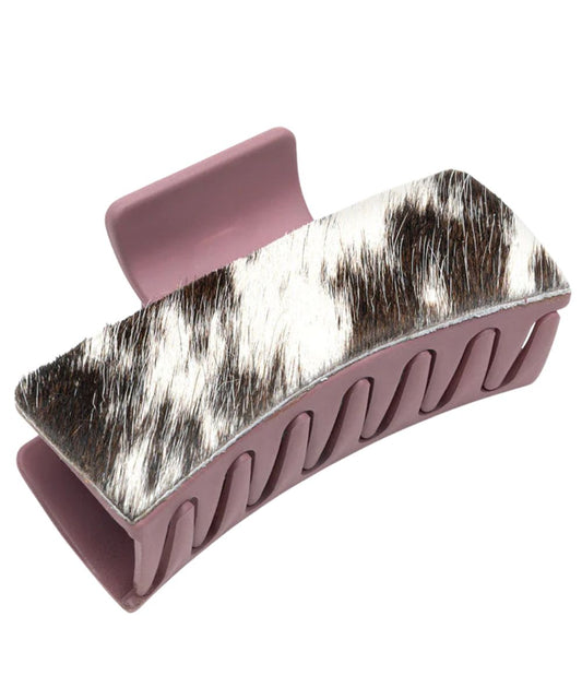 Women's dusty rose pink plastic hair clip by Myra Bags featuring black and white hair-on-hide leather side overlays.