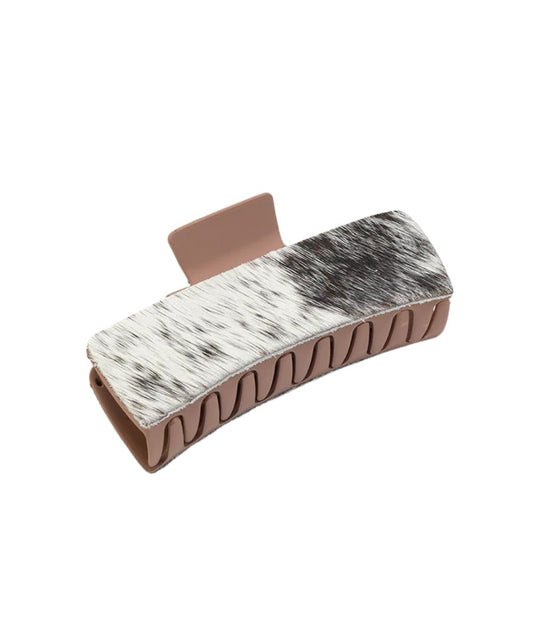 Brown women's plastic claw clip by Myra Bags featuring black and white hair-on-hide side overlays.