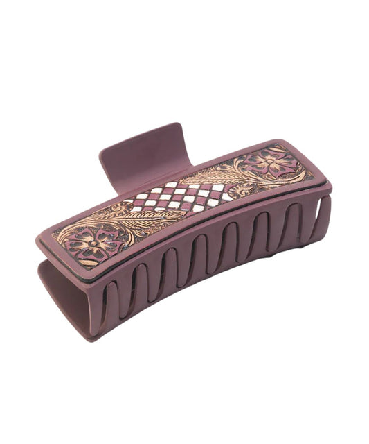 Women's ebony cream plastic claw clip featuring checkered and floral tooled leather overlays.