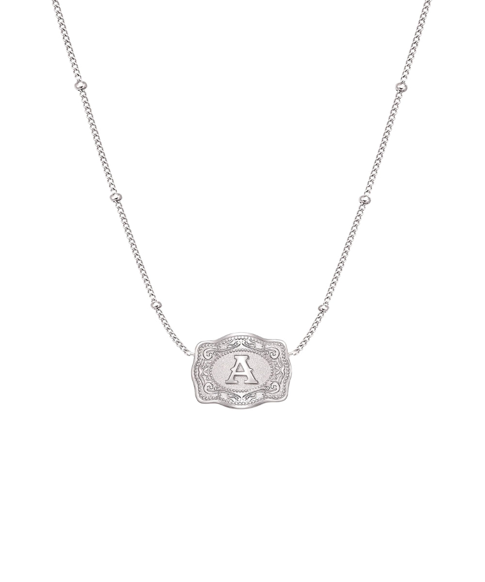 ultra mini silver belt buckle a initial necklace on white background