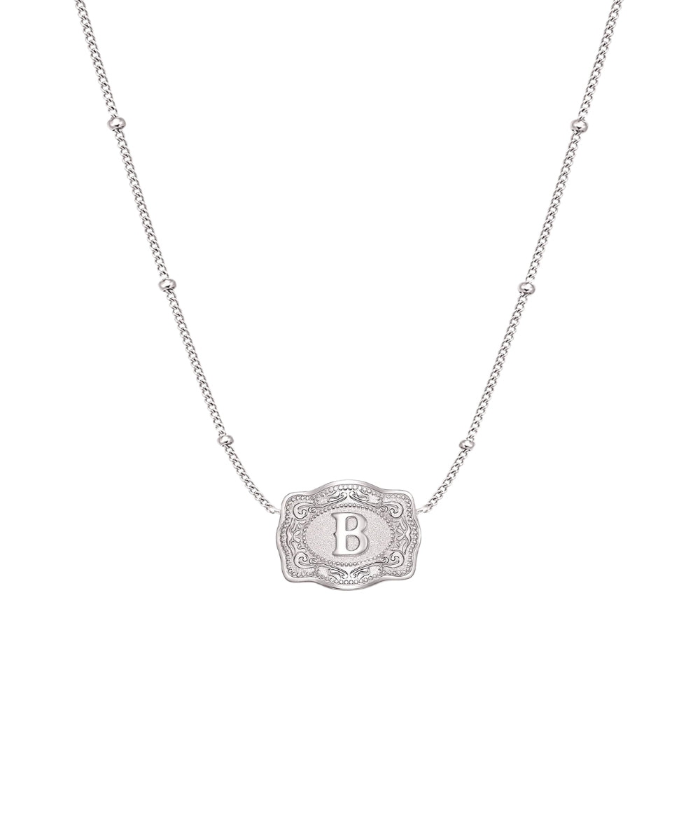 ultra mini silver belt buckle b initial necklace on white background