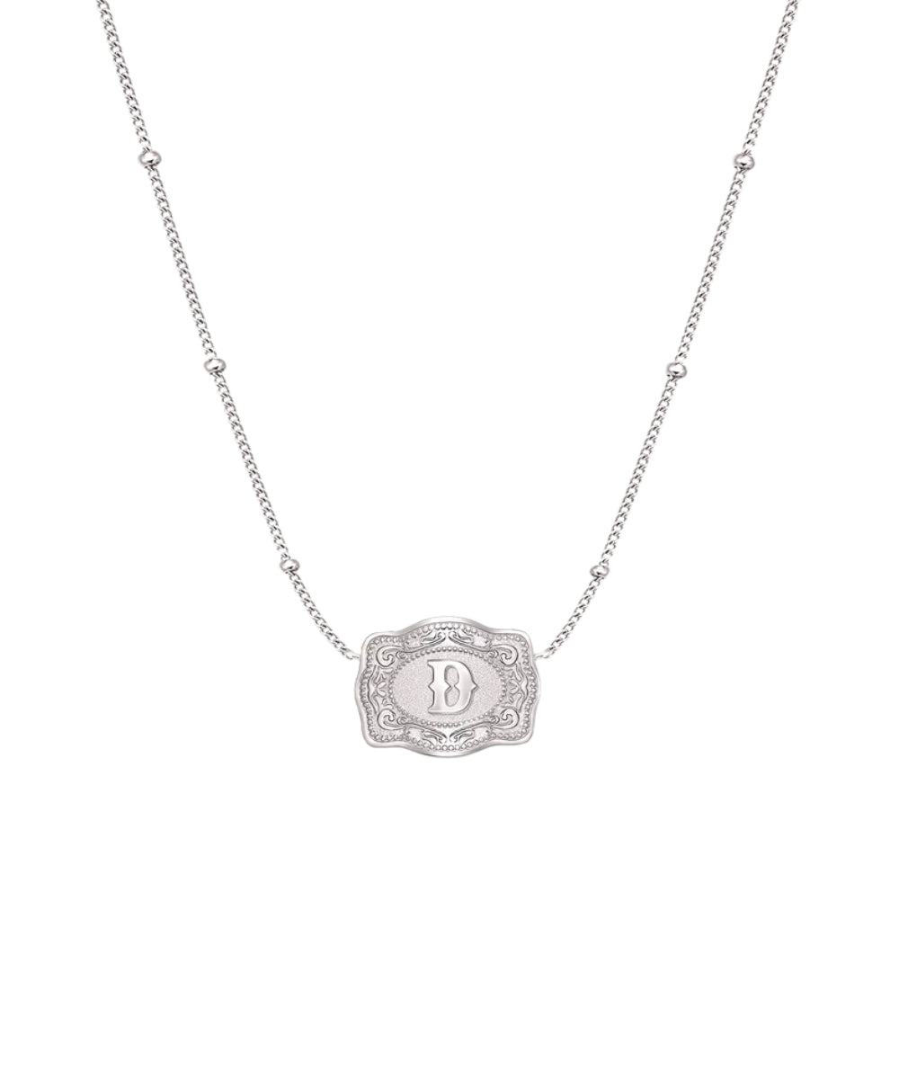 ultra mini silver belt buckle d initial necklace on white background 
