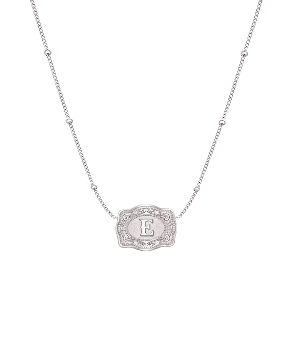 ultra mini silver belt buckle e initial necklace on white background