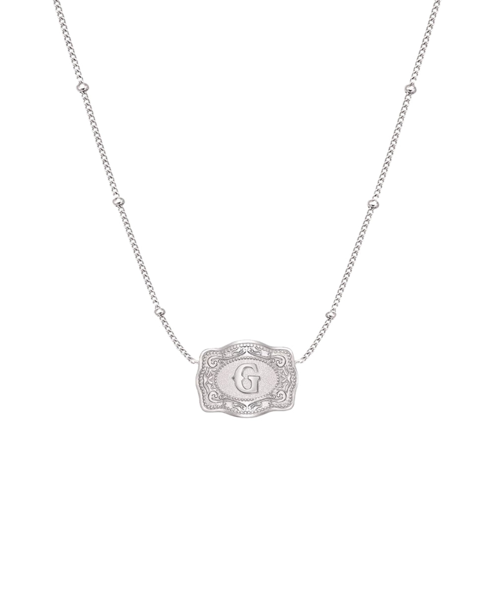 ultra mini silver belt buckle g initial necklace on white background