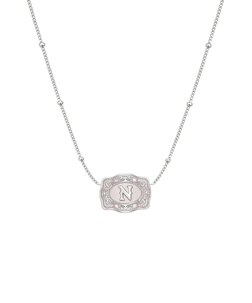 ultra mini silver mini belt buckle n initial necklace on white background