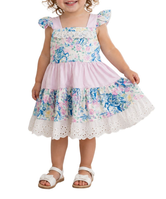 Front view of a girl modeling the white floral frontier ruffle dress