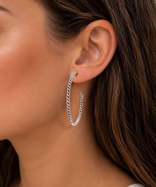 Women's silver tone medium-sized hoop earrings