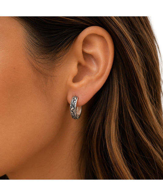 Model view of the women's silver hoop earrings