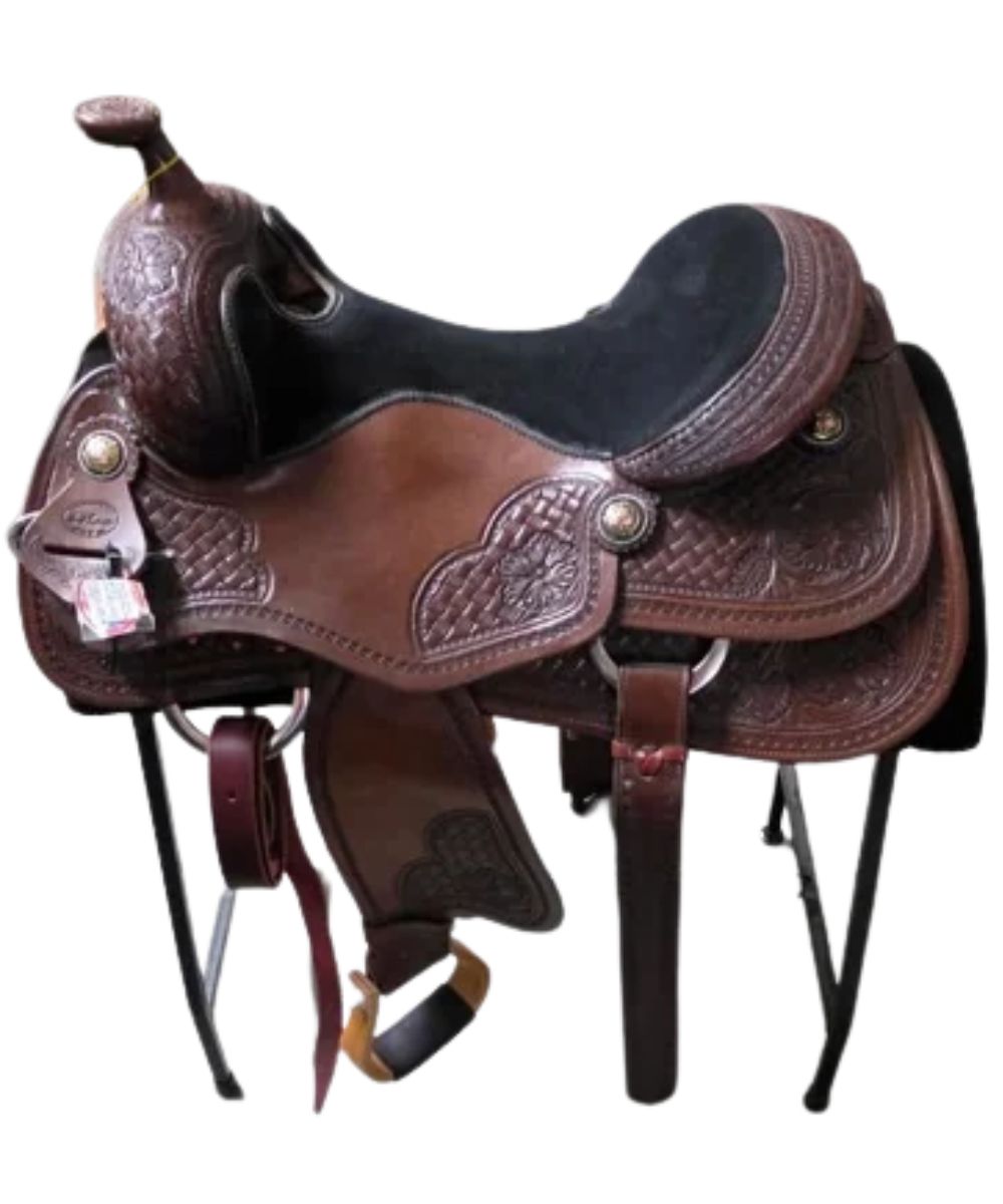 A brown leather western saddle with carved floral tooling, a black padded seat, shown on a saddle stand against a plain white background.