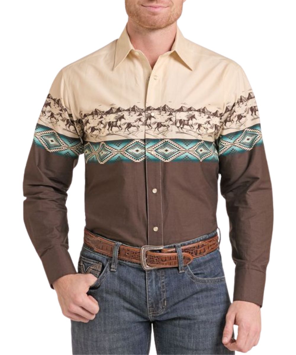 Front view of the men's Panhandle Aztec Landscape Border Snap Shirt featuring the regular fit, snap front placket, and snap flap chest pockets. This shirt also features a color blocked design with a brown lower half and tan upper half, and a aztec landscape border print across the chest and upper arms