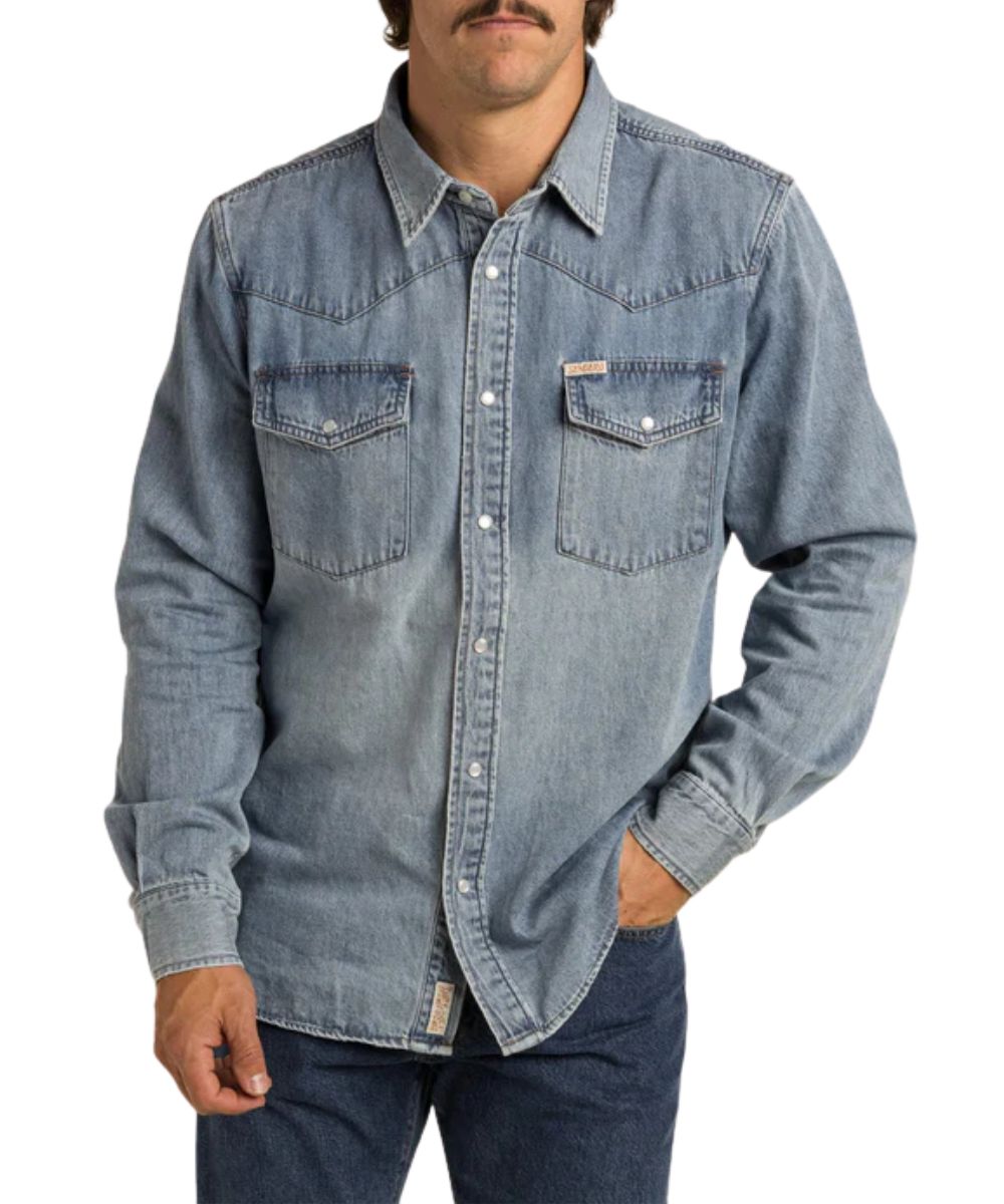 Front view of the vintage denim men's long sleeve pearl snap shirt featuring snap flap chest pockets and western yokes