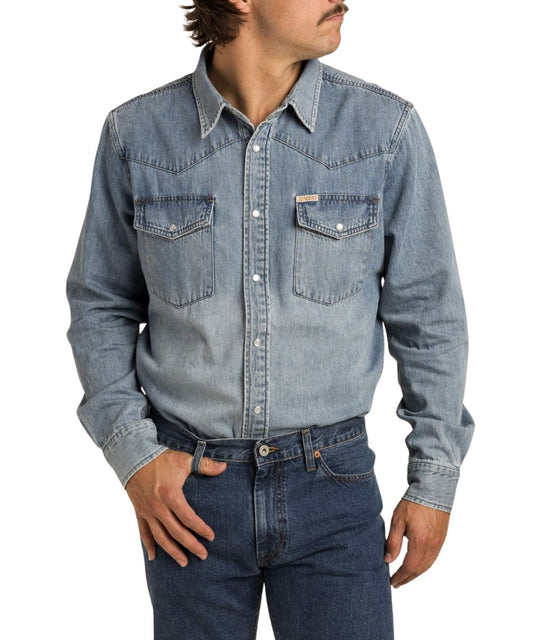 Men's long sleeve vintage denim pearl snap shirt tucked in