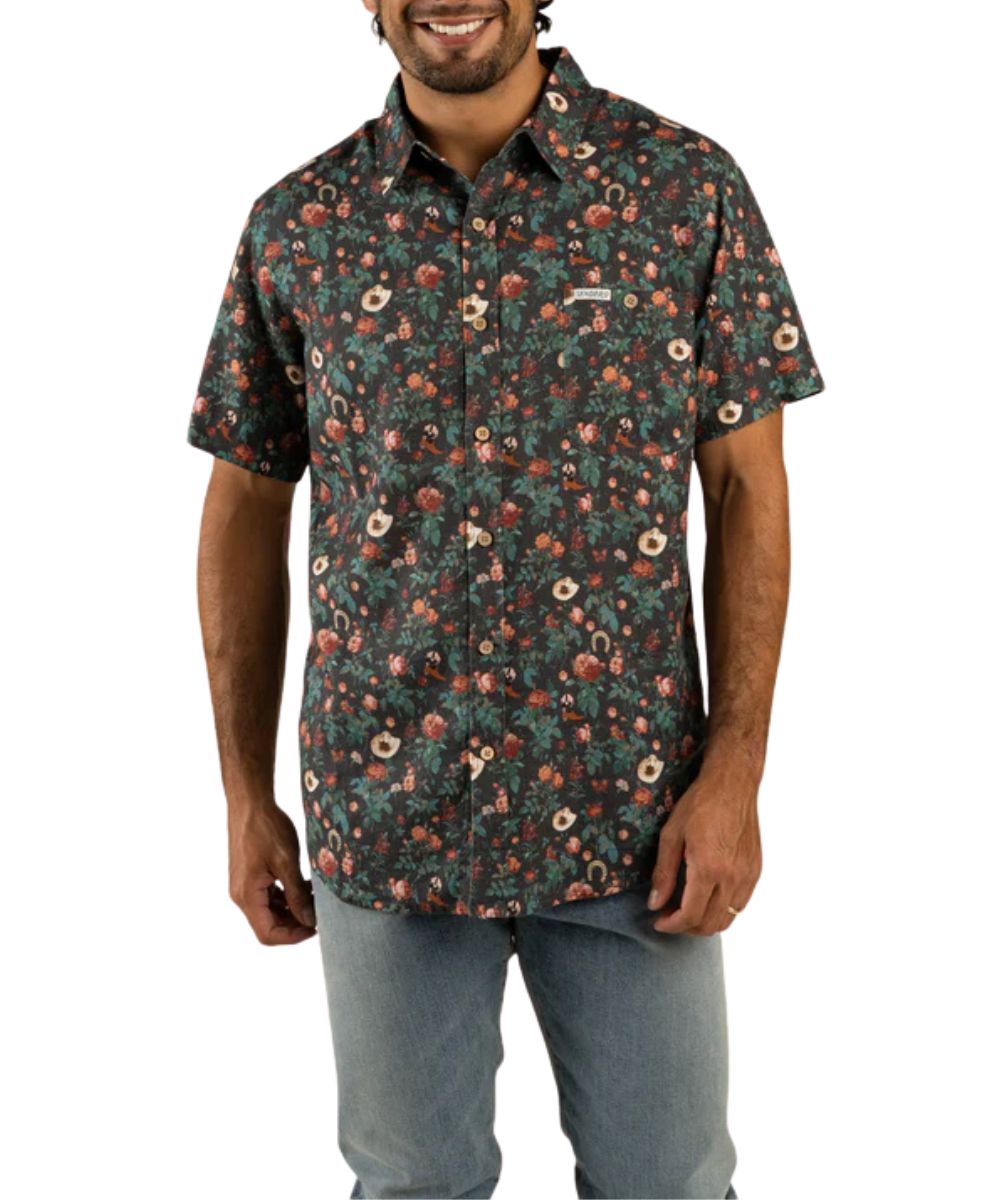 Front view of the men's charcoal short sleeve button down shirt featuring a desert rose print and single open chest pocket