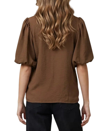 Back view of the women's brown puff sleeve blouse featuring the elbow-length sleeves