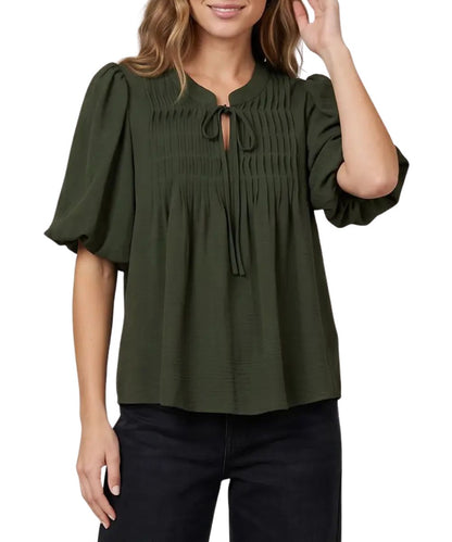 Front view of the women's olive green She + Sky short sleeve blouse featuring the split v-neckline, puff sleeves, and pintuck detailing on the chest