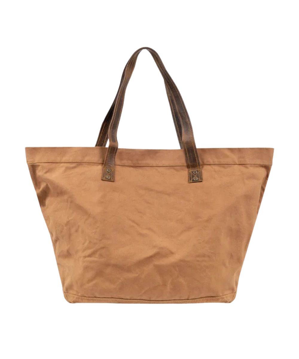 Back view of the large tan tote featuring the plain tan canvas back