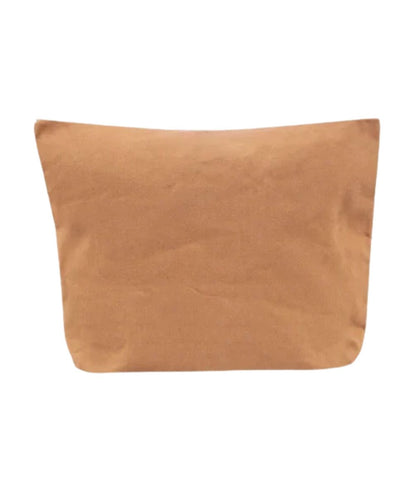 Back view of the men's tan canvas cosmetic pouch featuring the solid tan back