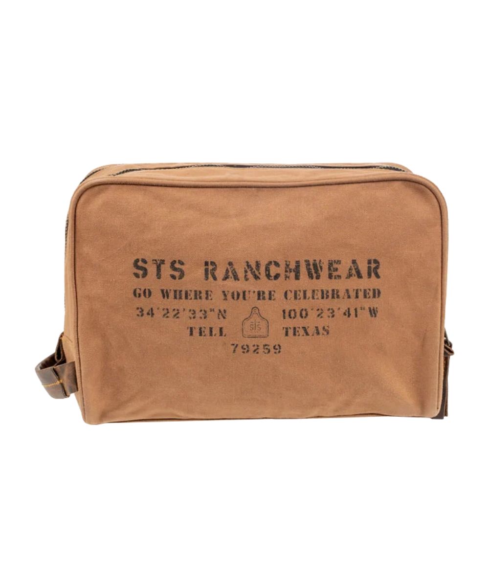 Front view of the men's tan STS Ranch Surplus Shave Kit featuring the assorted STS Ranchwear printed canvas and a side leather carry handle