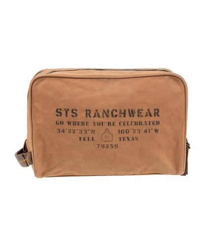 Front view of the men's tan STS Ranch Surplus Shave Kit featuring the assorted STS Ranchwear printed canvas and a side leather carry handle