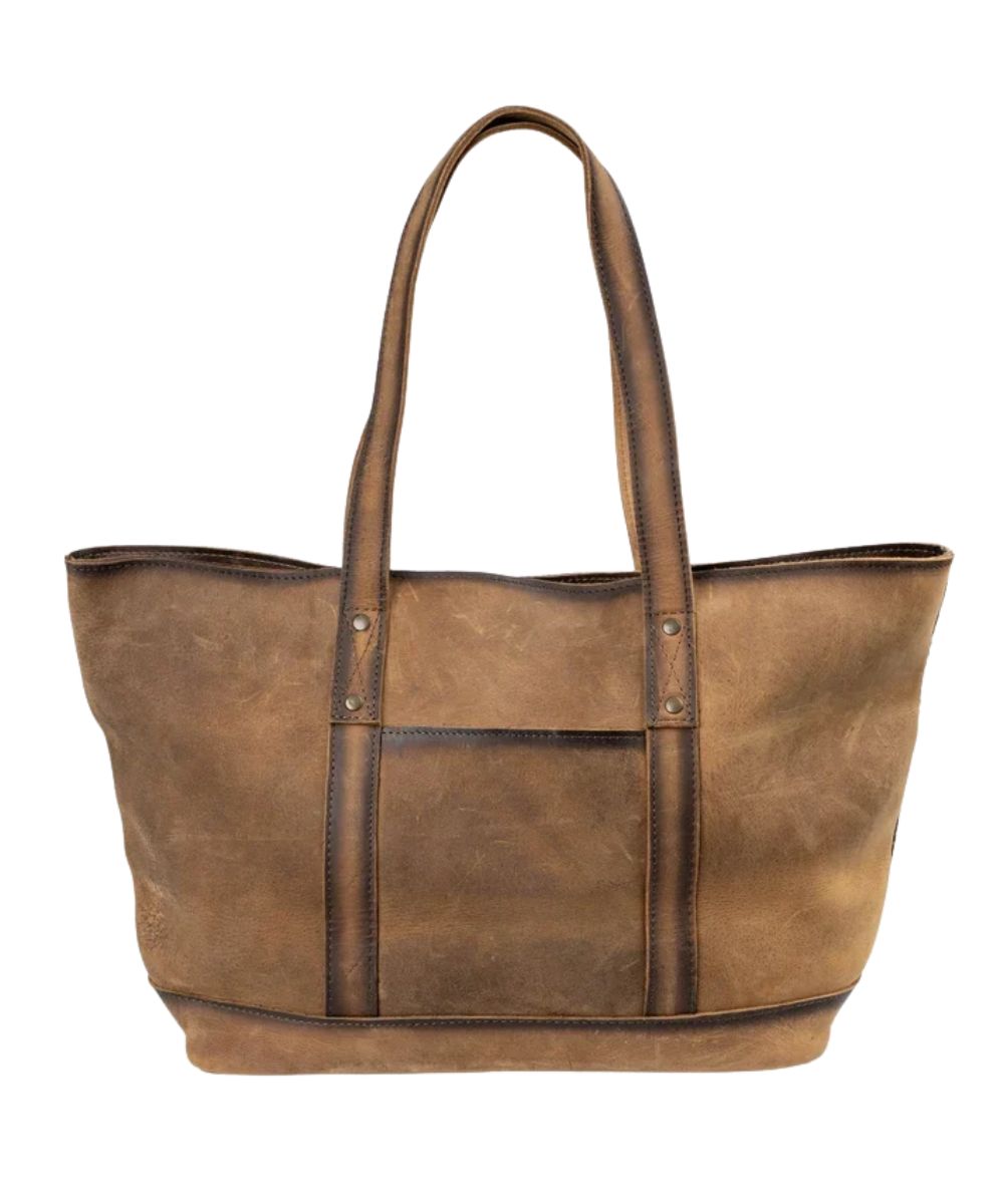 Back view of the women's brown tote bag featuring the exterior back slip pocket and solid leather back to prevent from rubbing