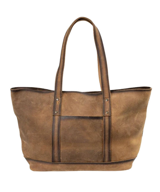Back view of the women's brown tote bag featuring the exterior back slip pocket and solid leather back to prevent from rubbing
