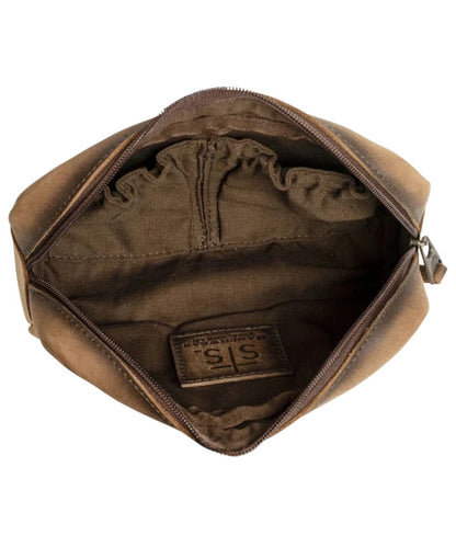 Interior view of the cosmetic bag featuring the interior scrunch pockets