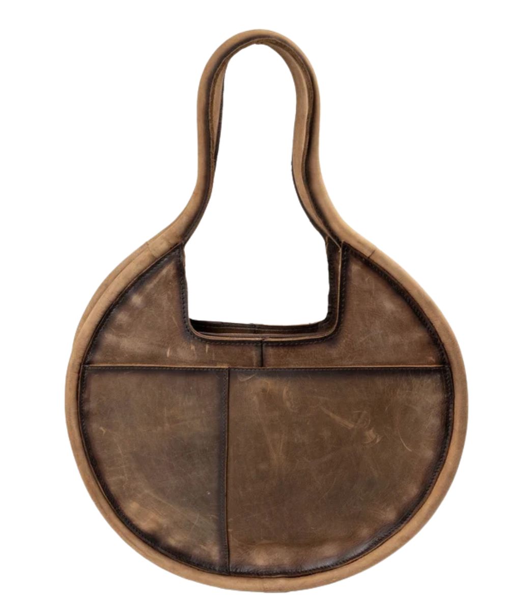 Back view of the solid brown leather back with an exterior snap slip pocket