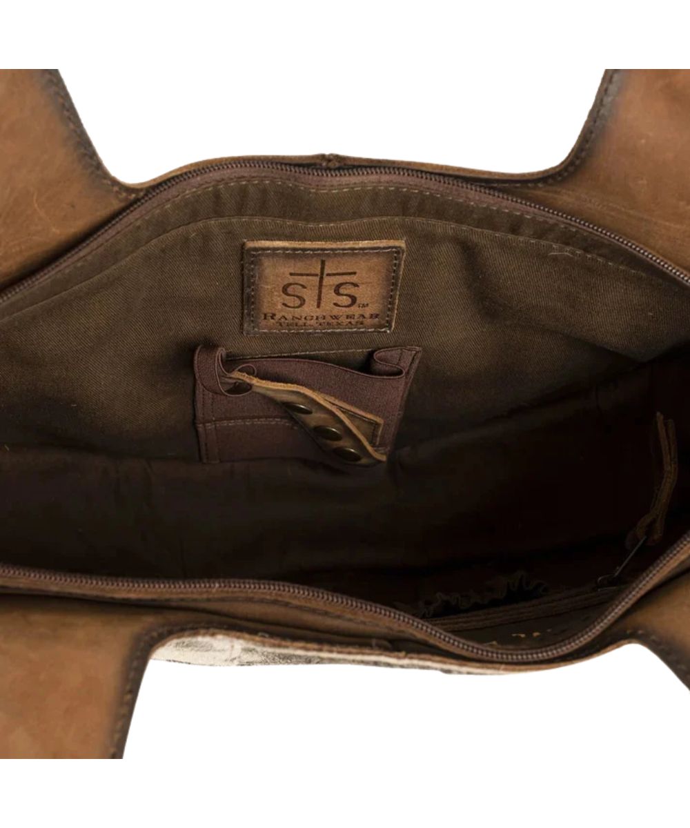 Interior view of the women's cowhide purse featuring the interior concealed carry pocket