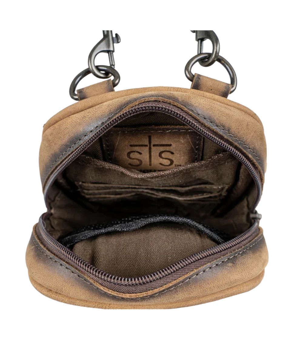 Interior view of the women's brown leather crossbody featuring the 2 interior slip pockets and 4 card slots